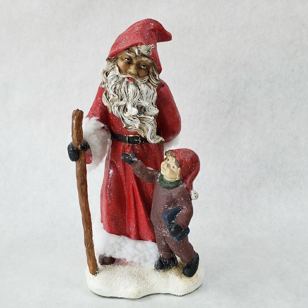Santa Claus Statue Santa Walking with Boy Hidding a present 11"